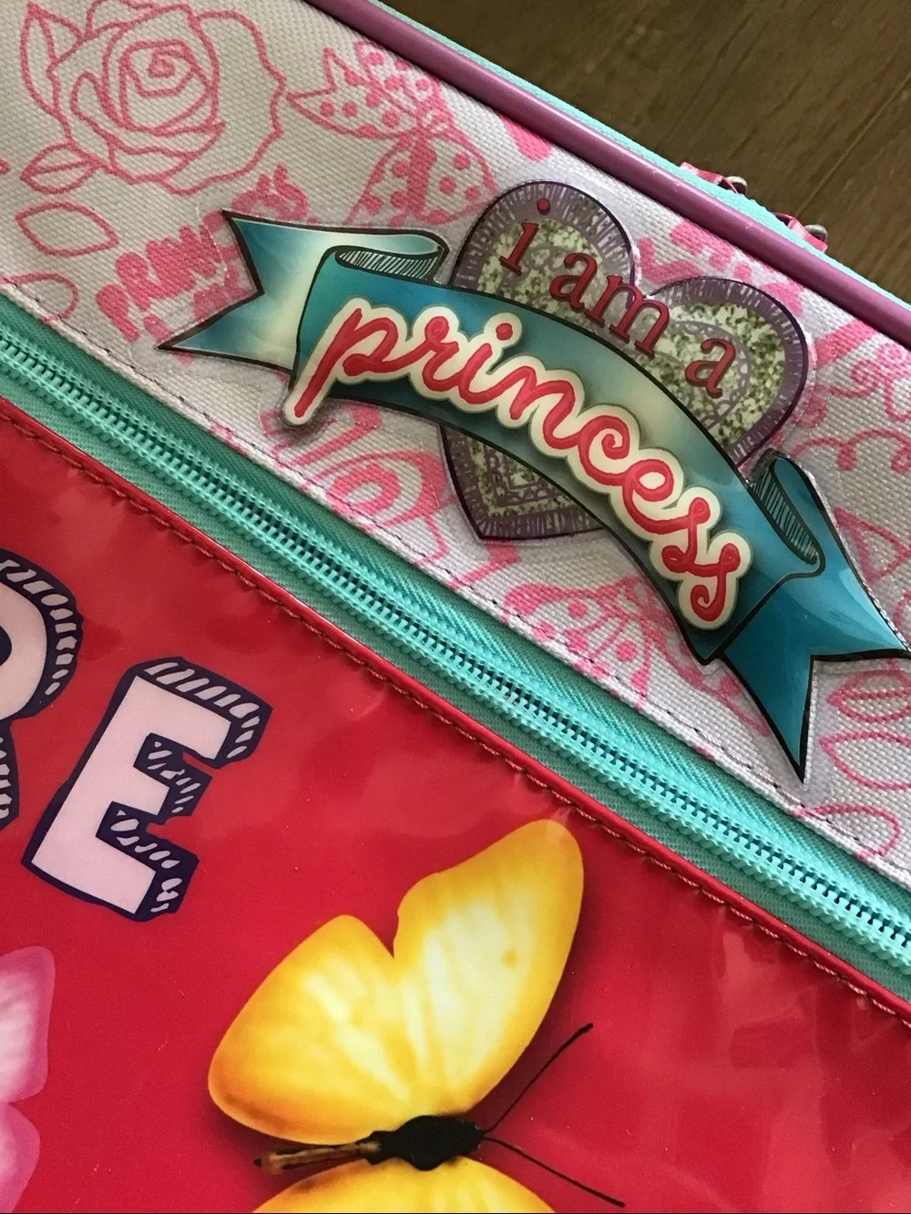 Disney Princess soft-sided 18-inch youth rolling suitcase